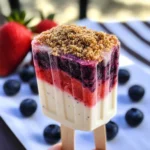 Boozy Red, White, and Blueberry Cheesecake Popsicles